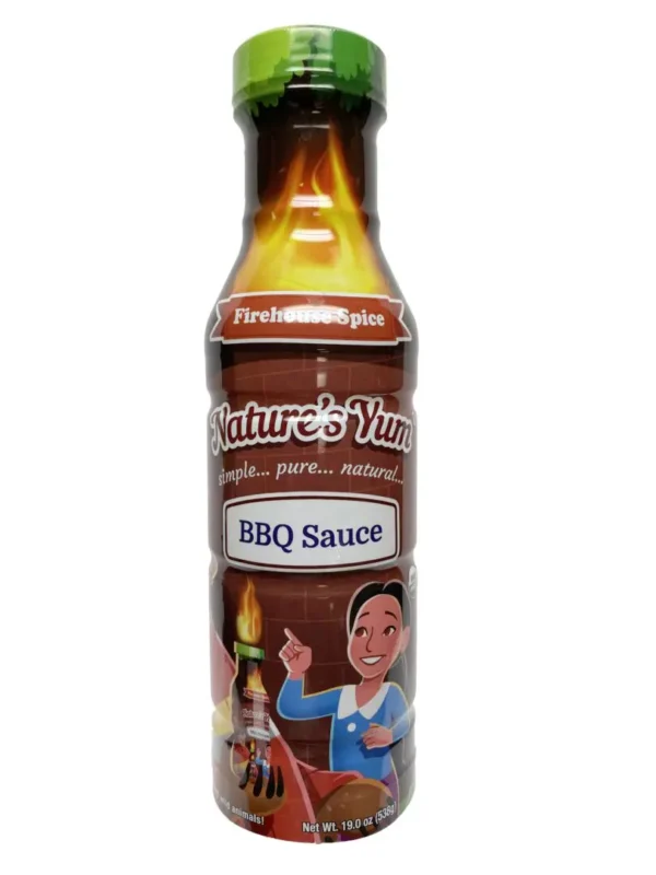A bottle of sauce with an image on it.